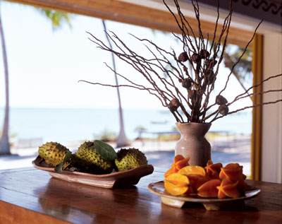 
The gardener's harvest of guanabana and carambola sets a luscious and inviting dining table against the beach backdrop.
